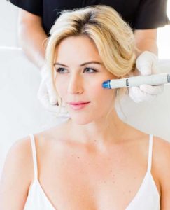 blond woman getting hydrafacial